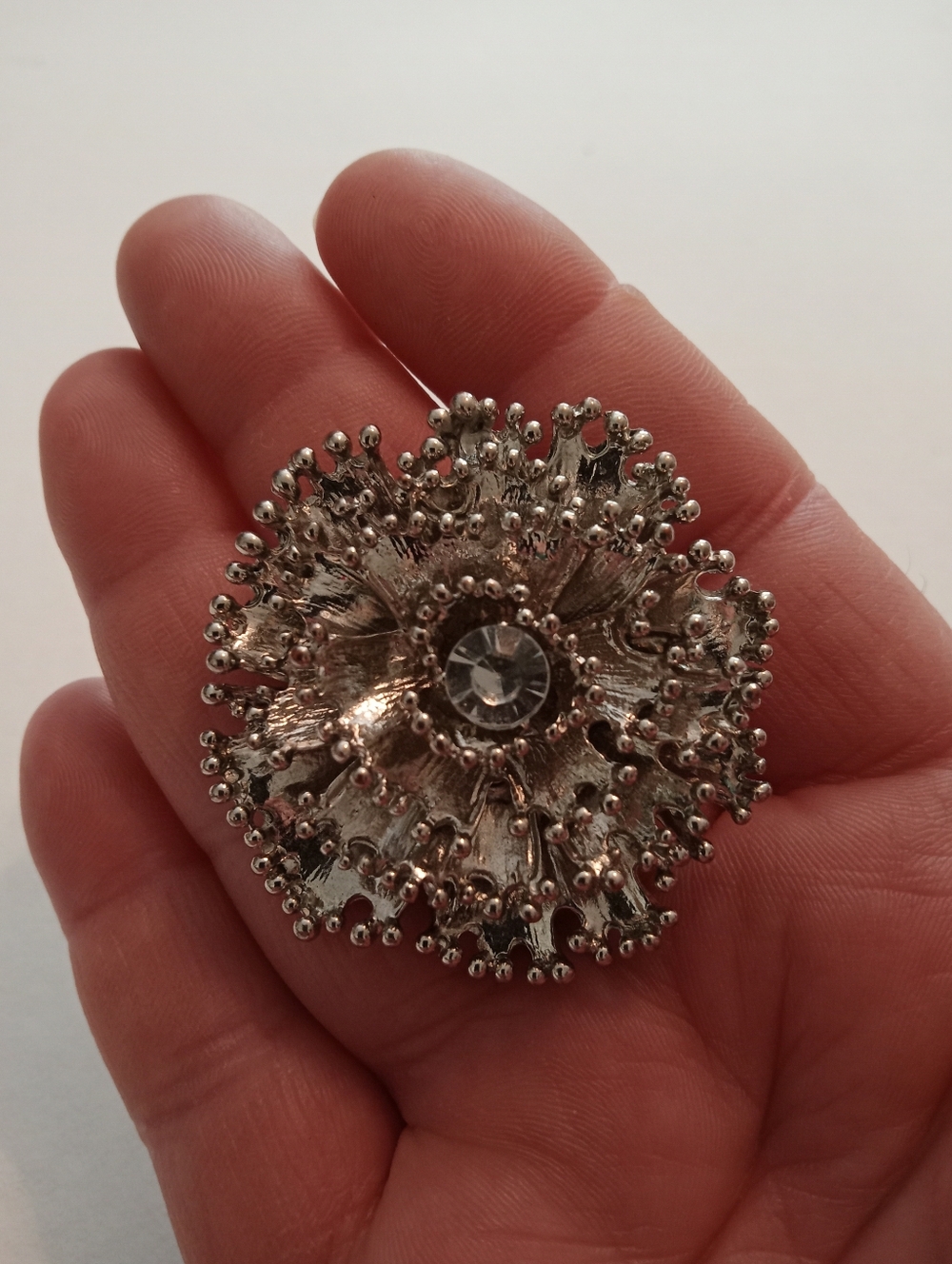 #1190.  Large Silver Toned Flower & Clear Rhinestone, Stretch Adjustable Ring.